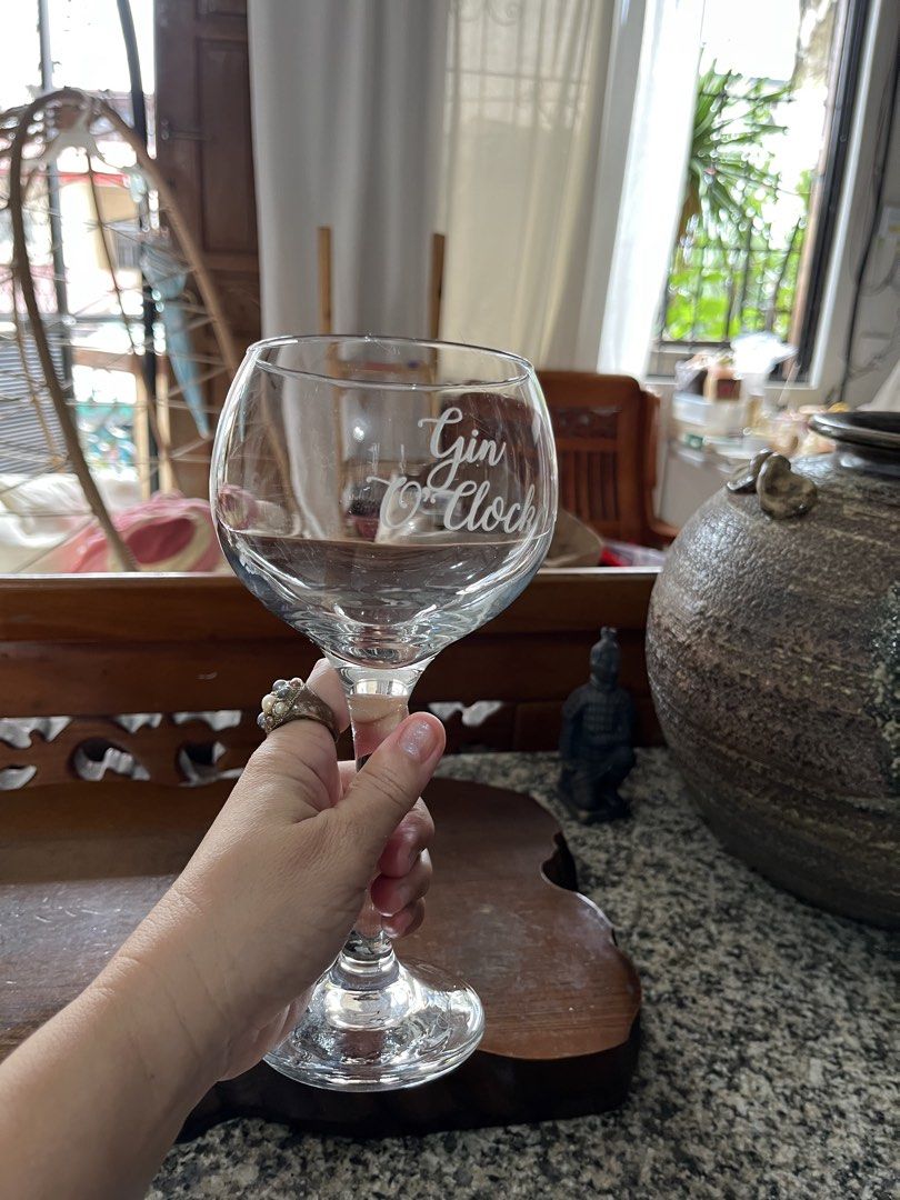 Gin O'Clock Wine Glass (Category: Water Bottles & Tumblers) located in Taguig. Submitted by minmin_parker (Listing ID 1461017464, Image 2). Description: - Fun wine glass with 'Gin O'Clock' text - Perfect for your evening drinks - Standard wine glass size - Great for gifts or personal use - Adds fun to your barware collection.
