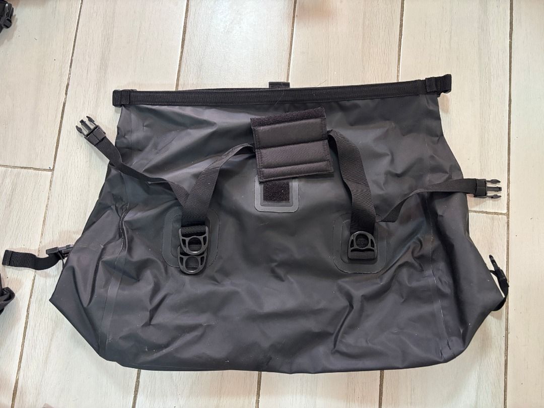 Givi Waterproof Motorcycle Duffle Bag (Category: Helmets and other Riding Gears) located in Antipolo. Submitted by dddeclutter (Listing ID 1461073071, Image 3). Description: Givi Waterproof Motorcycle Duffle Bag Color: Black 40liters Ideal for motorcycle Estimated Measurements: 65cm W x 48cm H x 28cm D Unused Bought at Motomarket Libis Price: PHP 2,800 RFS: Sold our motorcycle, selling accessories Photo with model and motorcycle for reference onl
