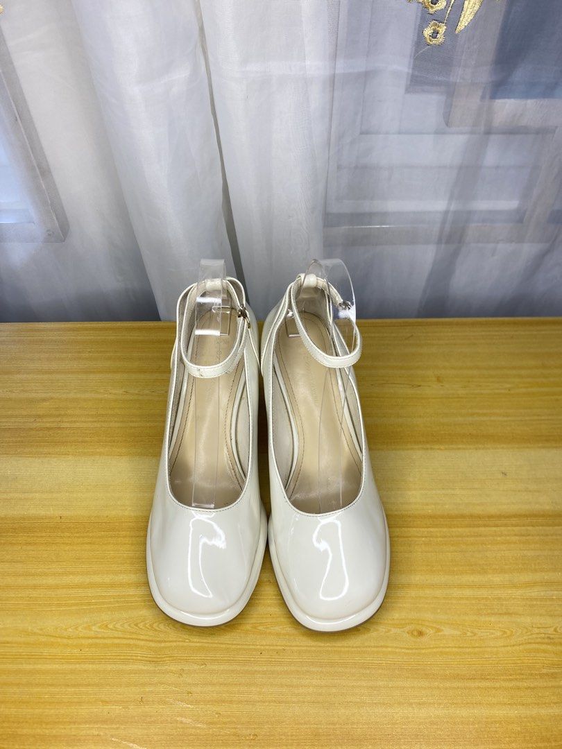 Glossy off-white Mary Jane pumps (Category: Heels) located in Davao. Submitted by kurt2021.turtle (Listing ID 1460921292, Image 1). Description: .