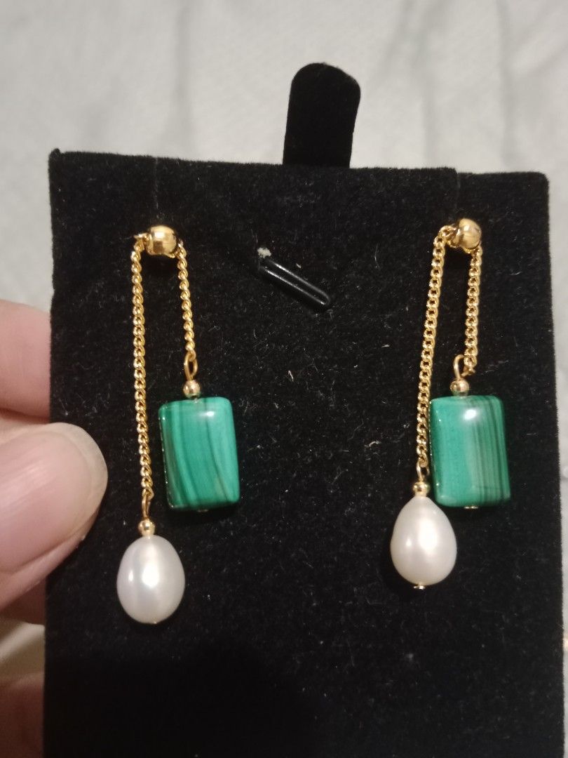 Gold Chain Malachite & Pearl Drop Earrings (Category: Earrings) located in Manila. Submitted by yethquiday (Listing ID 1461078020, Image 2). Description: - Unique gold chain dangle earrings - Features green malachite beads - Adorned with delicate white pearl drops - Versatile for dressing up or down - Adds a sophisticated pop of color to any outfit - Lightweight and comfortable for all-day wear.