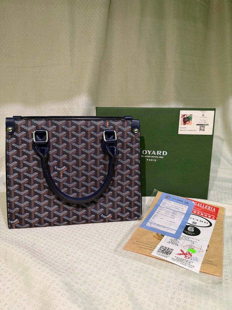 Goyard Tote Bag (Category: Luxury Bags & Wallets) located in Manila. Submitted by yoniii.15 (Listing ID 1461099427, Image 1). Description: - Authentic Goyard tote bag - Includes original box and purchase receipt - Features signature Goyardine canvas - Navy blue leather trim and handles - Perfect for everyday use - A stylish addition to your collection NEGO PRICE .