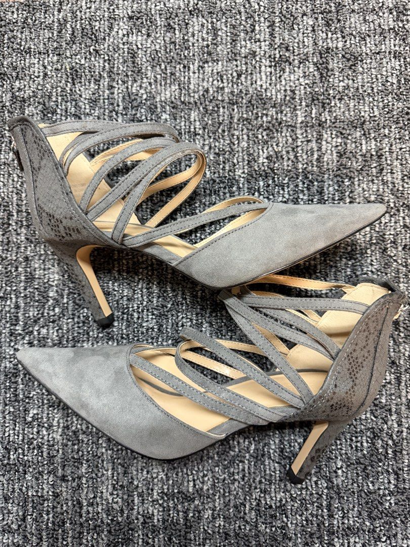Grey Suede Strappy Pointed Toe Heels (Category: Heels) located in Makati City. Submitted by bagattic_etc (Listing ID 1460941547, Image 3). Description: Chic grey suede heels with strappy design, pointed toe, and stiletto heel. Back zipper closure. Minimal wear on sole. Size 8.