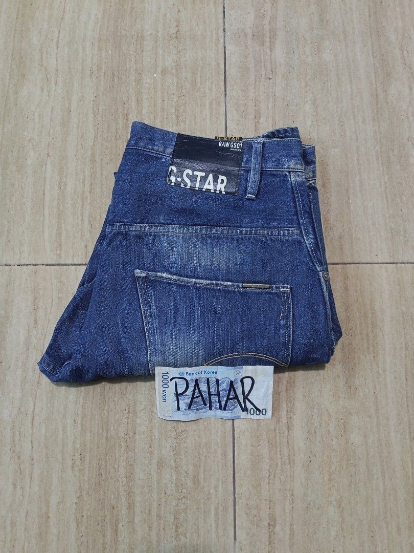 G-Star RAW 501 Denim Jeans (Category: Jeans) located in Glan. Submitted by cpaharodde48008 (Listing ID 1460962980, Image 1). Description: - Classic G-Star RAW denim jeans - Medium blue wash with distressed detailing - Straight leg fit - Button fly closure - Ideal for everyday wear - A wardrobe staple.