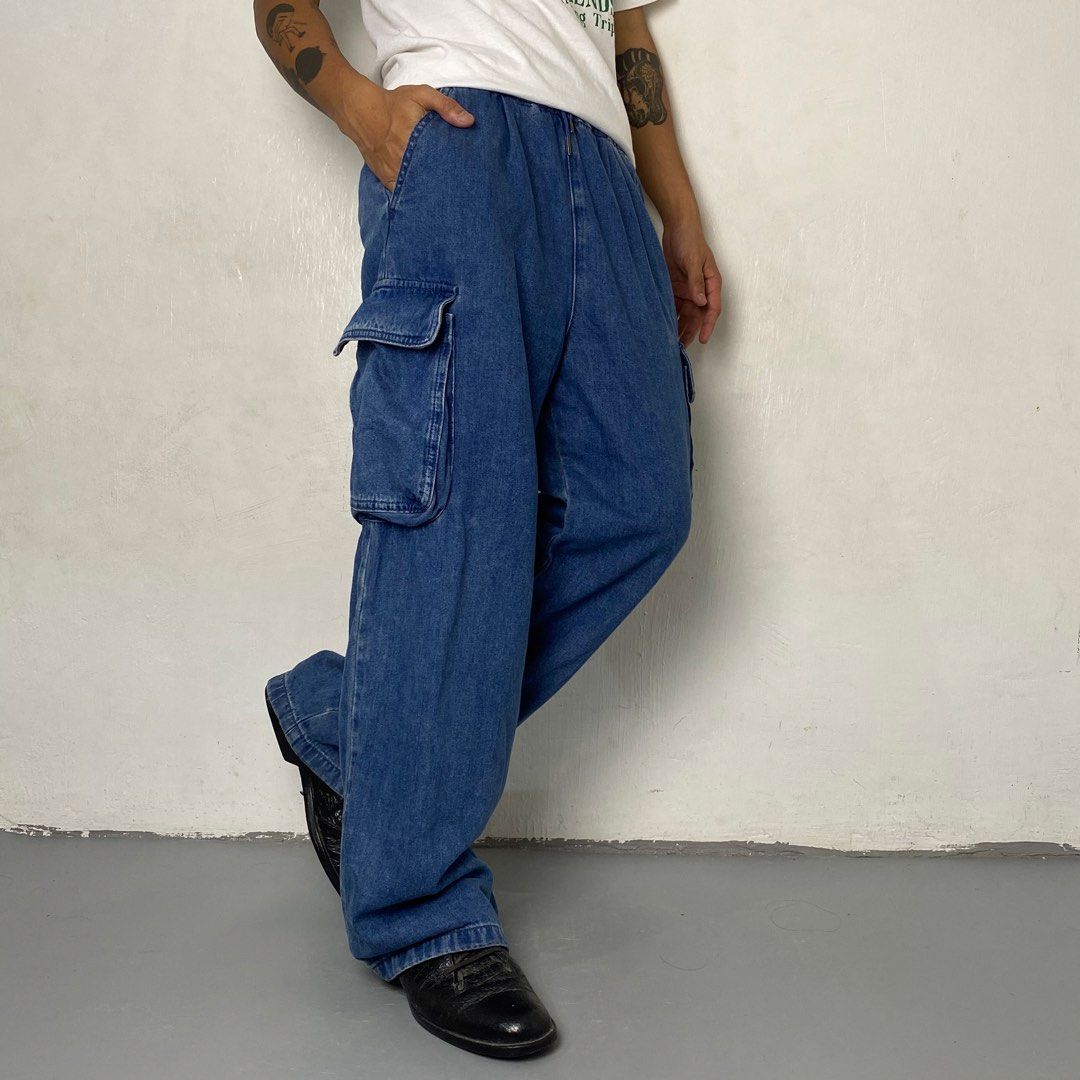 GU 👞| Blue Baggy Cargo Denim Pants (Category: Jeans) located in Bulacan. Submitted by orc.ph (Listing ID 1461050180, Image 3). Description: GU 👞| Blue Baggy Cargo Denim Pants Material Used: 100% Cotton -Japan -High Rise -Baggy -Spacious Cargo Pockets -Gathered Waistband -Streetwear -External Drawstring -Size: Free Size -Waistline: “24 | “35 -Length: “38 -Thighs: “12 -Leg Opening: “10 -Rise: “15 Model: ‘’5’5, 65kg, Waistline 32 - Medium to Large
