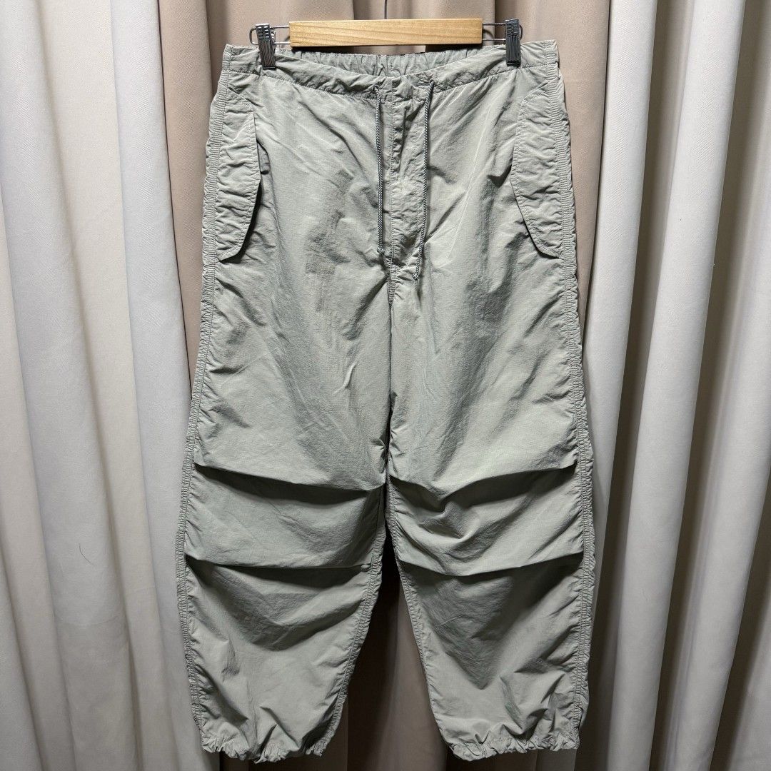 GU Men's Nylon Parachute Pants - Small (Category: Joggers) located in Bulacan. Submitted by kennmoldez (Listing ID 1461032349, Image 1). Description: Color: Sage green Size: Small Dimes: Waist 29-31" | Lenght 38" | Hem 10" Condition: Like new 10/10 Issue: None Mode of payment: Gcash (Payment first) Courier: J&T/Lalamove Location: SJDM, Bulacan Note: Thrifted item, already washed. Please manage your expectations..