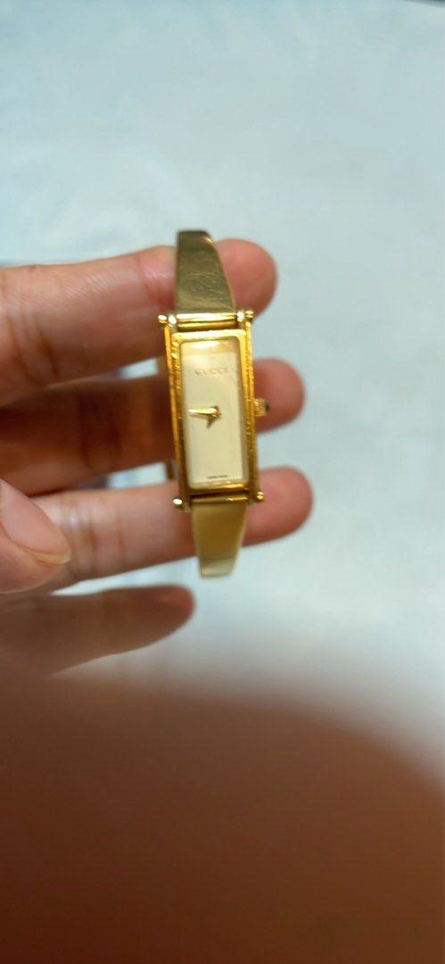 Gucci 1500L Gold Watch (Category: Luxury Watches) located in Rizal. Submitted by sanjane923 (Listing ID 1460922395, Image 1). Description: - Authentic Gucci 1500L Watch - Swiss Made - Stainless Steel - Rectangular Face with Cream Dial - Signature Gucci Horsebit Band Detail.