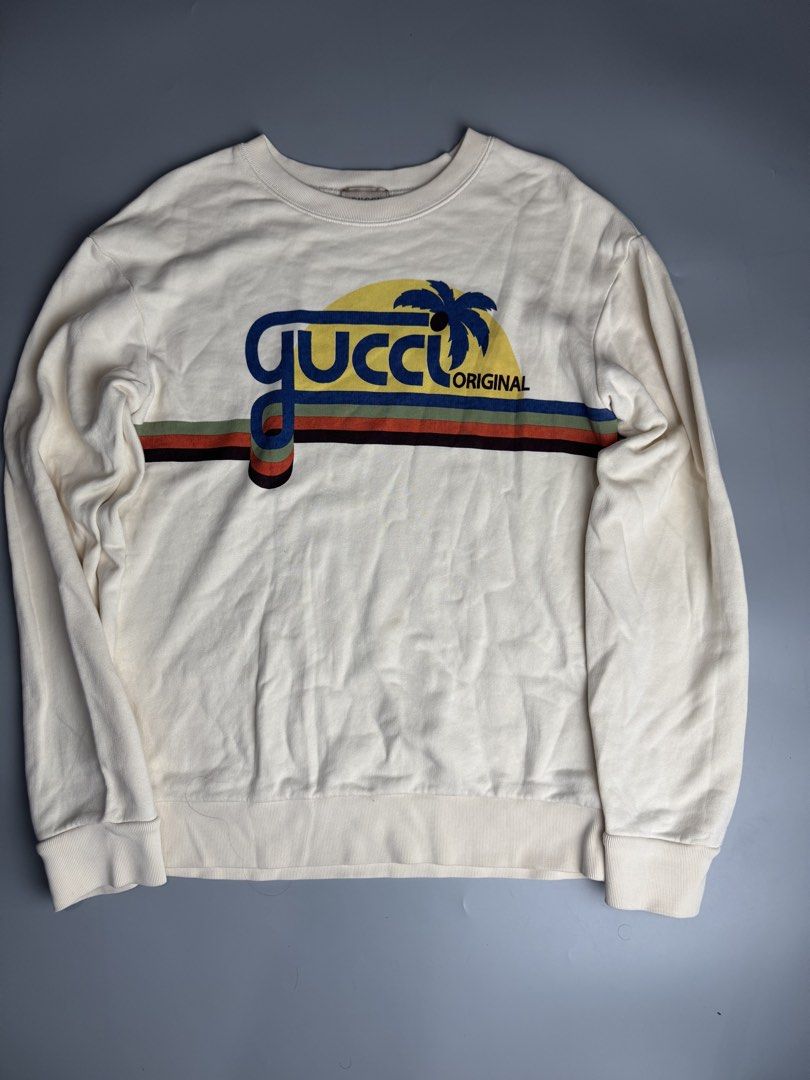 Gucci - Sunset Logo - Ivory Cotton (Category: Luxury Apparel) located in San Pablo. Submitted by hiddenrygn (Listing ID 1461056915, Image 1). Description: Gucci - Sunset Logo - Ivory Cotton Size : 12 on tag fits M (18” 25”) No flaws Minor dirt not visible Authentic DM!.