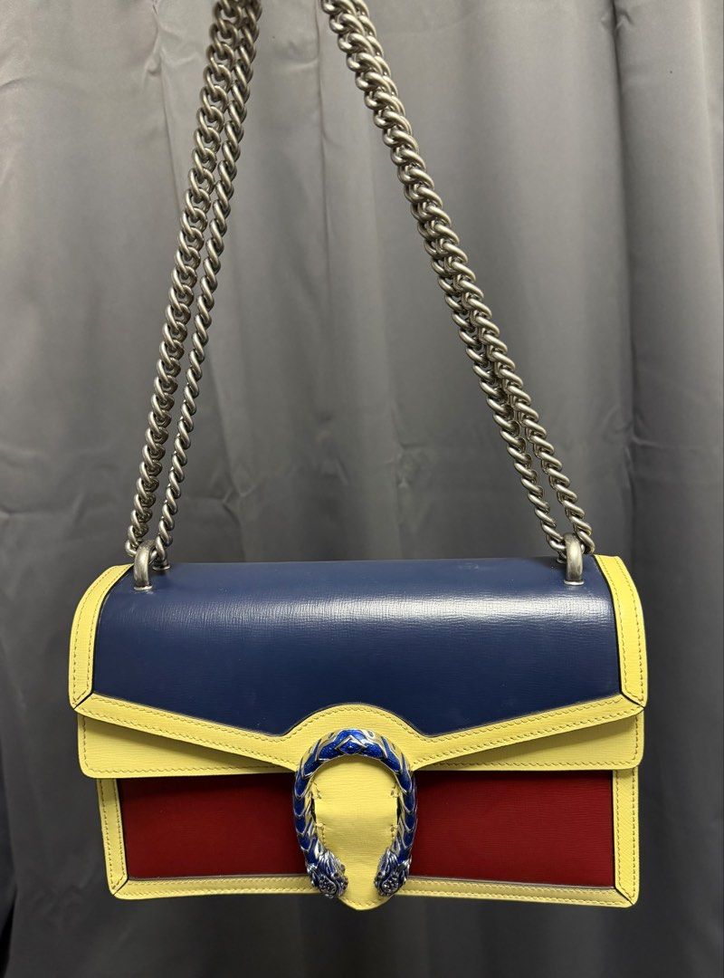 Gucci Azalea Dionysus (Category: Luxury Bags & Wallets) located in Marikina City. Submitted by 000christina000 (Listing ID 1460955095, Image 1). Description: - Brand: Gucci - Model: Azalea Dionysus - Type: Shoulder Bag - Color: Blue, Yellow, Red color block - Features: Iconic tiger head closure - Condition: Layered condition 4 - Meetup locations available: SM City Caloocan, SM City Fairview, Starbucks Timog Ave..