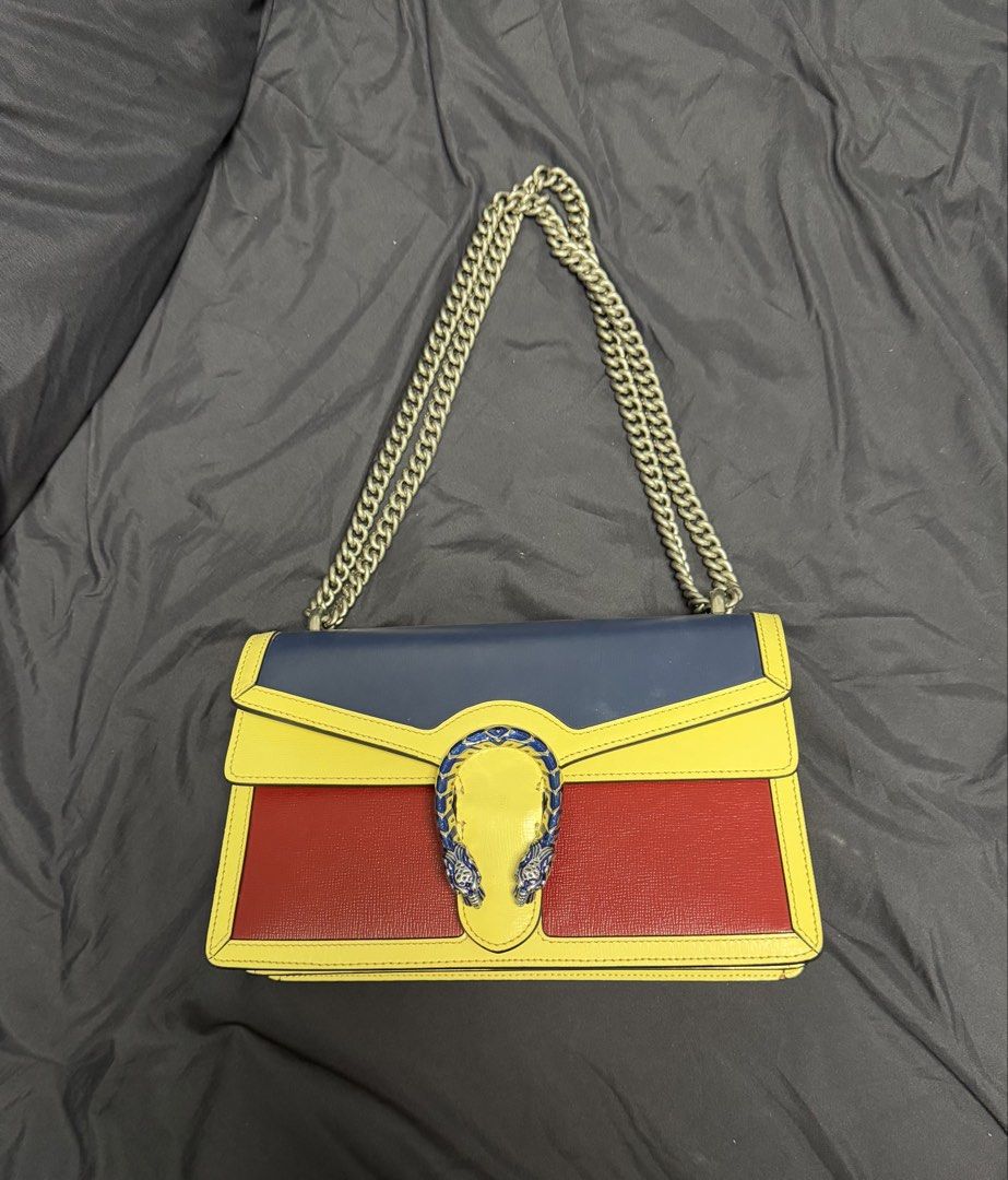 Gucci Azalea Dionysus (Category: Luxury Bags & Wallets) located in Marikina City. Submitted by 000christina000 (Listing ID 1460955095, Image 2). Description: - Brand: Gucci - Model: Azalea Dionysus - Type: Shoulder Bag - Color: Blue, Yellow, Red color block - Features: Iconic tiger head closure - Condition: Layered condition 4 - Meetup locations available: SM City Caloocan, SM City Fairview, Starbucks Timog Ave..