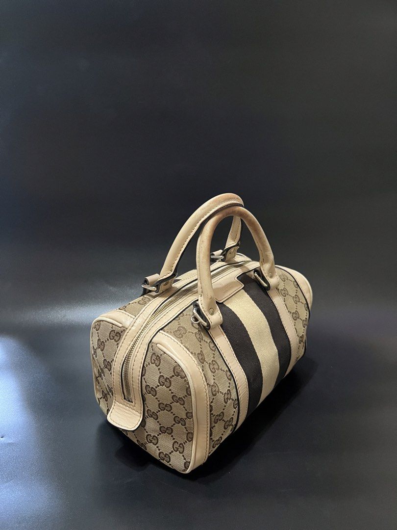 Gucci Monogram Boston Bag (Category: Luxury Bags & Wallets) located in Cebu City. Submitted by sexyclosetph2.0 (Listing ID 1460922077, Image 3). Description: In great condition Watermark on the handles (twilly nyo nlng po) Dirt on the inside But no rubs po on the body and leathers Bag spa nyo nlng po Still very nice! .