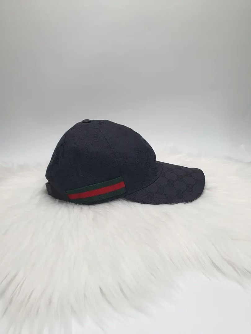 Gucci Original GG Canvas Baseball Hat With Web Navy (Category: Caps & Hats) located in Manila. Submitted by aftermarketphilippines (Listing ID 1460931952, Image 2). Description: Gucci GG Canvas Baseball Hat With Web Navy 9.5/10 (Good As New) Used No issue Price : 12,000 HMU Location : San Juan City Courier : J&T EXPRESS or LALAMOVE AROUND METRO MANILA.