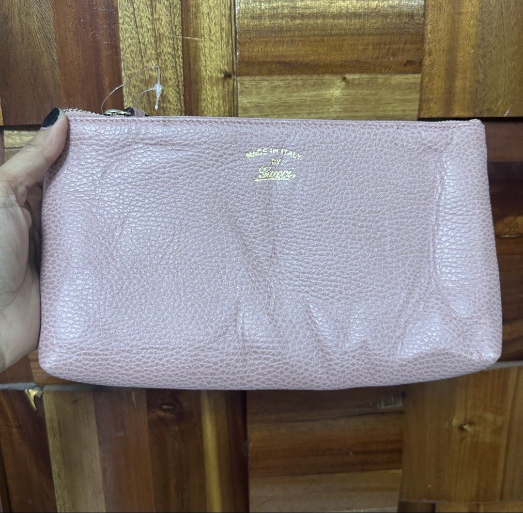 Gucci Pink Leather Pouch (Category: Luxury Bags & Wallets) located in General Trias. Submitted by mimispreloves (Listing ID 1461092457, Image 3). Description: - Authentic Gucci pouch - Lovely pink shade - Made in Italy - Textured leather exterior - Interior slip pocket - Zipper closure - Ideal for organizing essentials or as a clutch.
