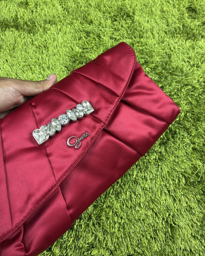 Guess Red Satin Evening Clutch (Category: Clutches) located in Lucena. Submitted by shopdotmane (Listing ID 1461074038, Image 2). Description: GUESS Red Satin Evening Clutch Still with tags Excellent condition Very presentable on date nights .
