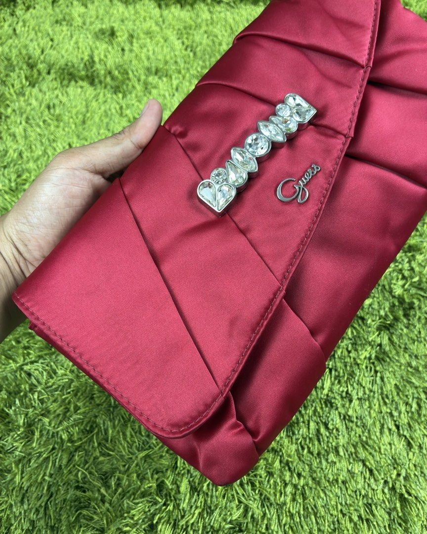 Guess Red Satin Evening Clutch (Category: Clutches) located in Lucena. Submitted by shopdotmane (Listing ID 1461074038, Image 3). Description: GUESS Red Satin Evening Clutch Still with tags Excellent condition Very presentable on date nights .