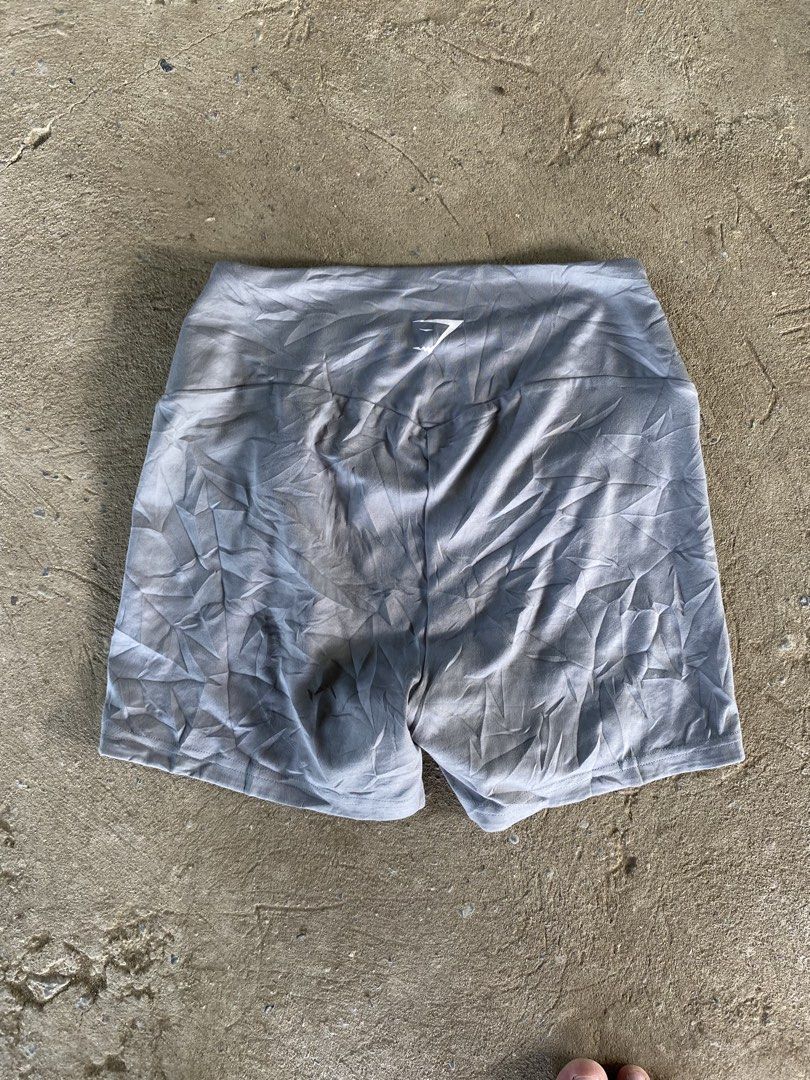 Gymshark Grey Marl Seamless Shorts Size M (Category: Activewear) located in Sinait. Submitted by rinzuthrift (Listing ID 1460936897, Image 2). Description: - Grey marl Gymshark seamless shorts - High-waisted fit - Made from 78% polyester, 22% elastane - Comfortable and stretchy material - Ideal for workouts or lounging - Machine washable (check care label for details).