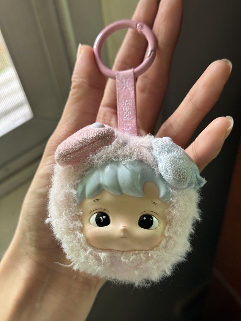 HACIPUPU The Constellation Series Pisces (Category: Designer & Blind Box Toys) located in Pasig City. Submitted by beautyloversph (Listing ID 1460941852, Image 1). Description: - Authentic POP MART keychain charm - Zodiac Series: Pisces edition check pic for item condition needs washing - Features a fluffy texture and adorable face - Includes a ring and strap for easy attachment to bags, backpacks, or keys - Ideal collectible for Labubu enthusias