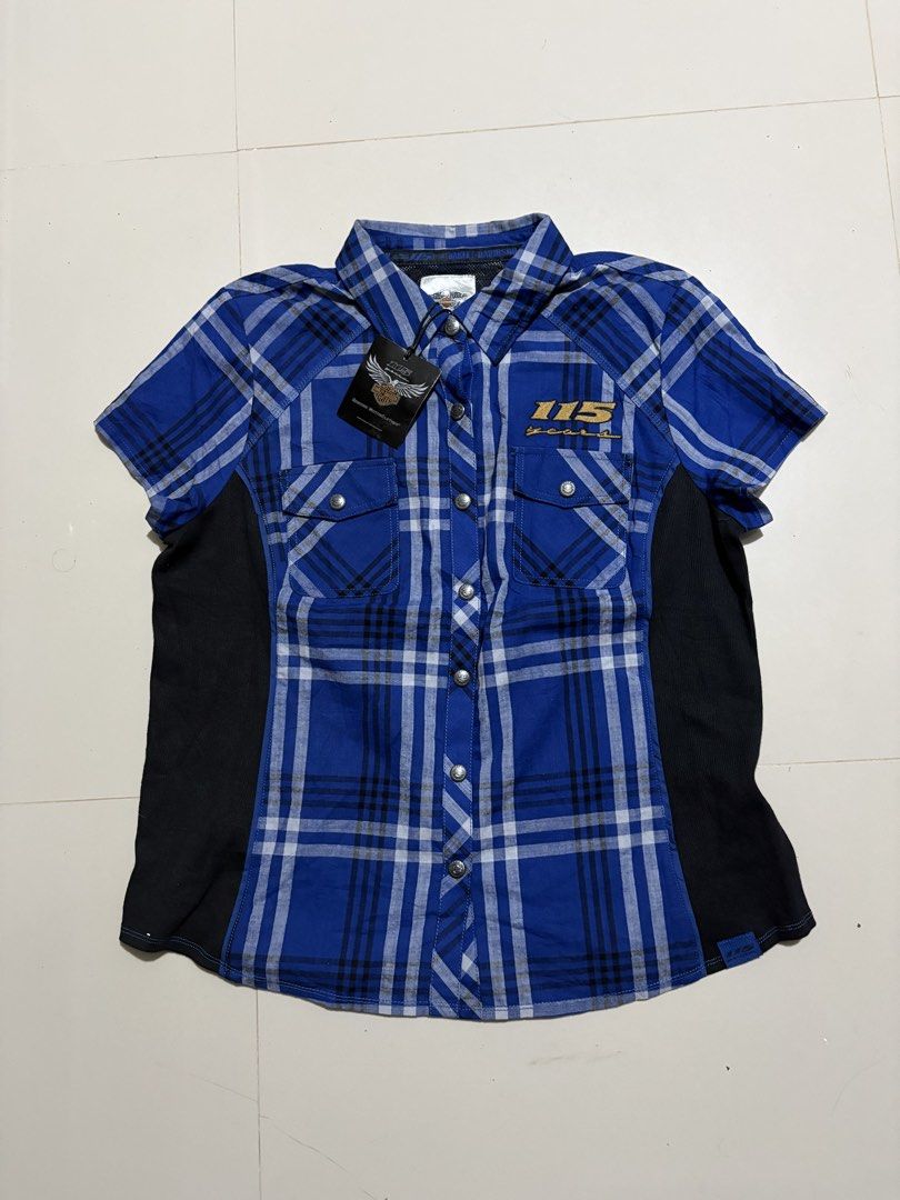 Harley Davidsons (Category: Others Tops) located in Echague. Submitted by jake_rc (Listing ID 1460923999, Image 1). Description: Harley-Davidson 115th Anniversary blue plaid short-sleeve shirt featuring black side panels and “115 Years” embroidery above the chest pocket. For Womens Size XL on tag Dimes 21.5 x 26 Brandnew condition with hangtags Price 850 plus SF.