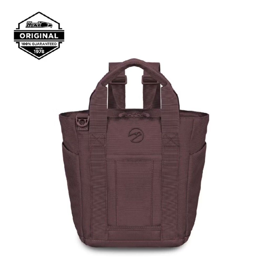 Hawk Original 2-Way Mini Tote Bag / Backpack (Category: Cross-body Bags) located in Quezon City. Submitted by sophiekyut12 (Listing ID 1460979965, Image 1). Description: - Hawk Original tote bag - Versatile: wear as a tote or a backpack - Adjustable straps for a custom fit - Convenient side pockets for easy access - Made from durable material for long-lasting use - Ideal for everyday adventures.