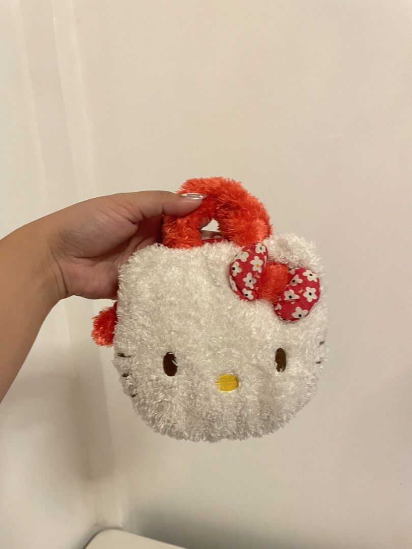 Hello Kitty Fluffy White Pouch with Red Bow (Category: Other Stationery & Craft) located in Iba. Submitted by wealtheallymari99 (Listing ID 1461084085, Image 1). Description: .