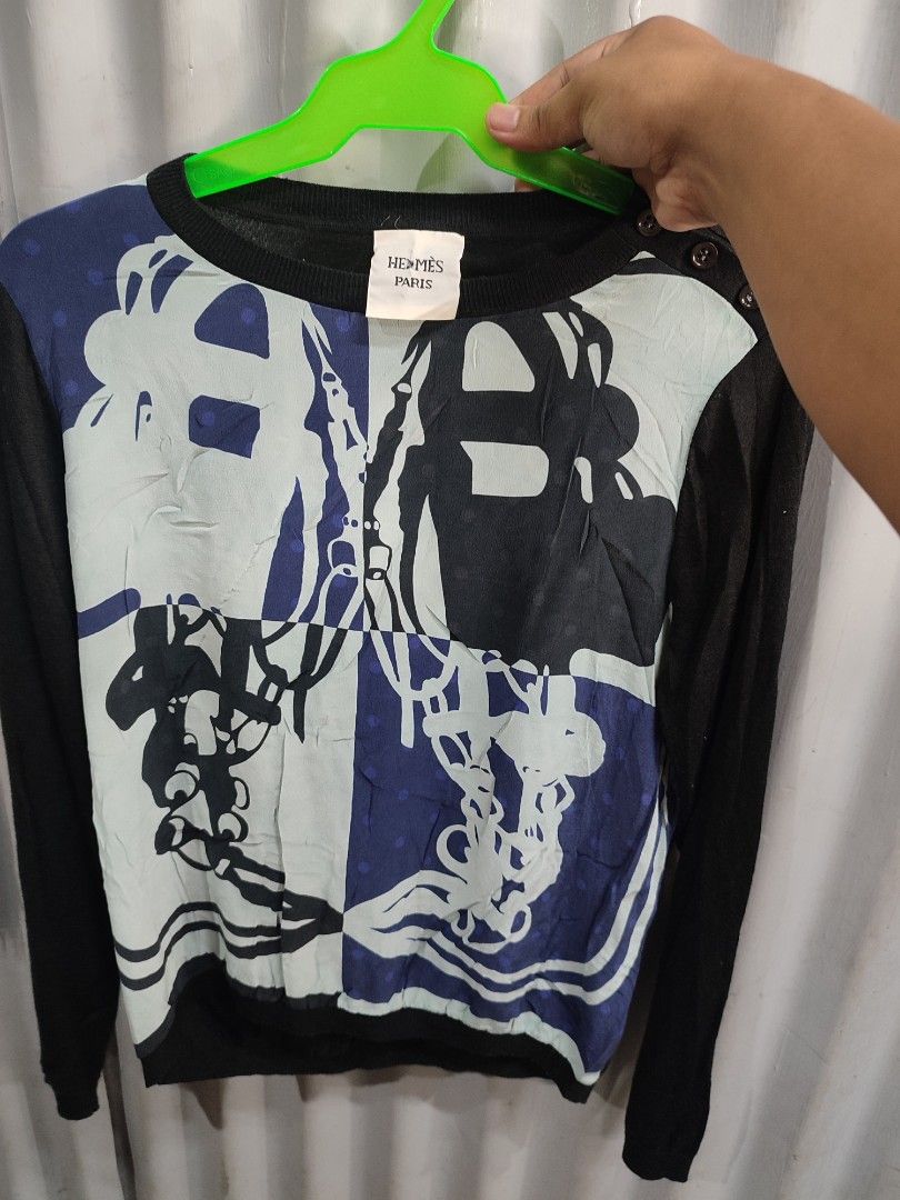 Hermes Paris Long Sleeve Sweater (Category: Longsleeves) located in Puerto Princesa. Submitted by thriftedsoulsy2k (Listing ID 1460941361, Image 1). Description: - Hermes Paris long sleeve sweater - Size: Medium (M) - Unique graphic print on the front - Black sleeves and neckline - Luxurious fabric blend: Tencel, Lyocell, Silk, and Wool - A stylish addition to your wardrobe.