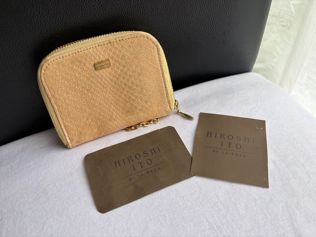Hiroshi Ito by La-Brea Snake Wristlet (Category: Purses & Pouches) located in Quezon City. Submitted by WasalakTwo (Listing ID 1460945464, Image 1). Description: Bought in Japan High quality Excellent condition Clean and presentable Open for delivery nationwide.