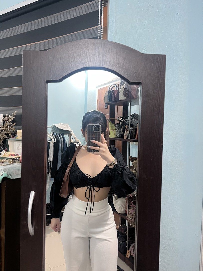 H&M Black Puff Sleeve Tie Front Crop Top (Category: Blouses) located in Manila. Submitted by camieday04 (Listing ID 1461105350, Image 2). Description: - Black crop top from H&M - Features puff sleeves - Tie front detail - Square neckline - Versatile for going out or casual days.