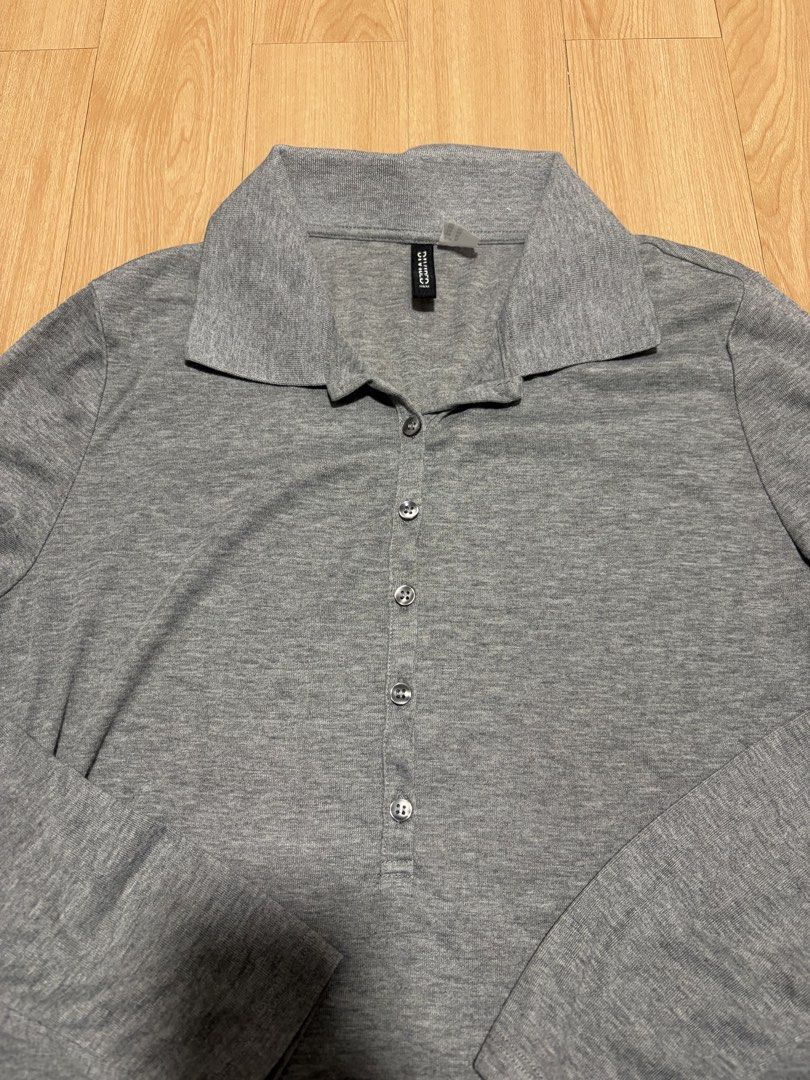 H&M Gray Half Button Longsleeve Top (Category: Longsleeves) located in Pasig City. Submitted by alyannamm (Listing ID 1461091518, Image 2). Description: Worn once. Good as new. Color may vary due to lighting - thin material Mop:gcash/gotyme/maribank mod: lalamove/grab/lbc * discounts for same day delivery orders meet ups are also available.
