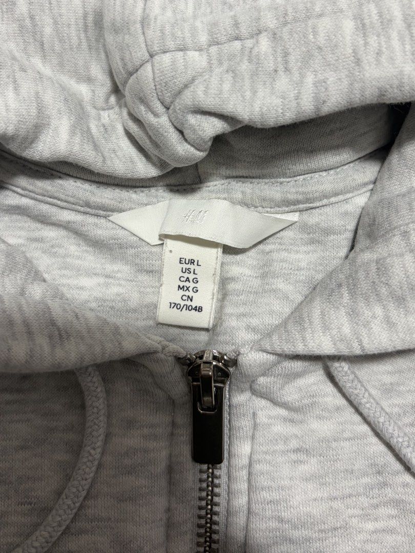 H&M Gray Zip Up Hoodie (Category: Coats, Jackets and Outerwear) located in Pasig City. Submitted by alyannamm (Listing ID 1461092606, Image 2). Description: Good as new. Color may vary due to lighting Mop:gcash/gotyme/maribank mod: lalamove/grab/lbc * discounts for same day delivery orders meet ups are also available.