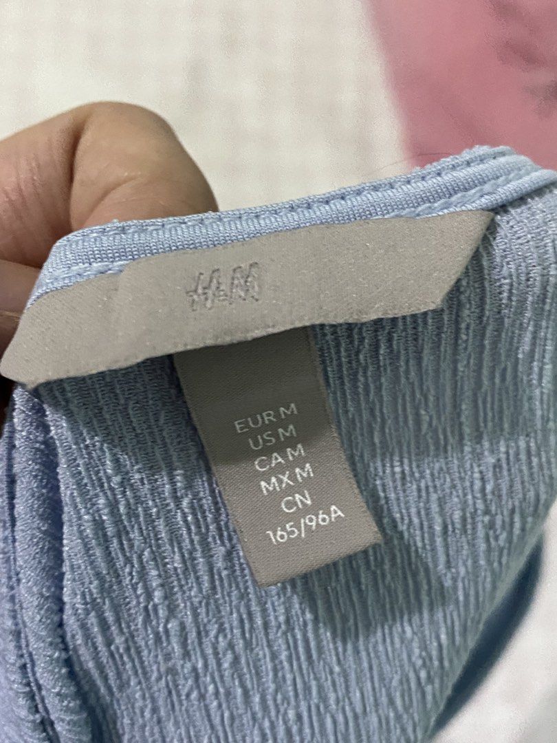 H&M Sleeveless Ruched Top Light Blue - Size M (Category: Sleeveless) located in Angeles City. Submitted by dwnmxn (Listing ID 1461079274, Image 2). Description: Light blue sleeveless top from H&M Size: Medium In very good condition.