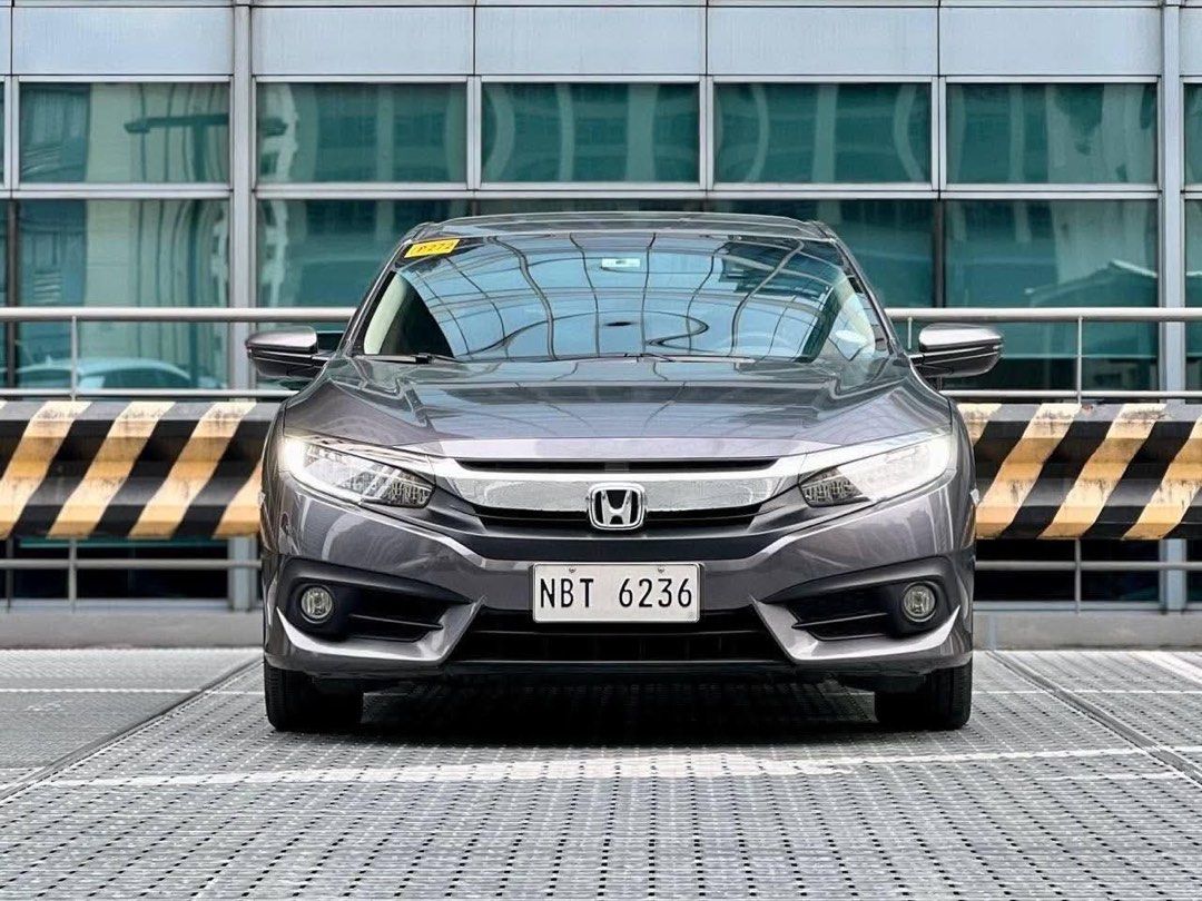 Honda Civic 1.8 (A) (Category: Used Cars) located in Makati City. Submitted by maby_latido05 (Listing ID 1461015753, Image 1). Description: 2018 Honda Civic 1.8 E Gas AT 71k ALL IN DP‼️🔥 ALL IN LOW DP PROMO ALL IN CASHOUT - Php 71,000 2 YRS - Php 38,801 3 YRS - Php 28,035 4 YRS - Php 23,247 (Chattel & Insurance included) FREE FULL VEHICLE SCANNING FREE Transfer FREE Detailing FREE Bank Processing 100% LEGIT MILEAGE 1ST OWNERSHIP Well-maintained 