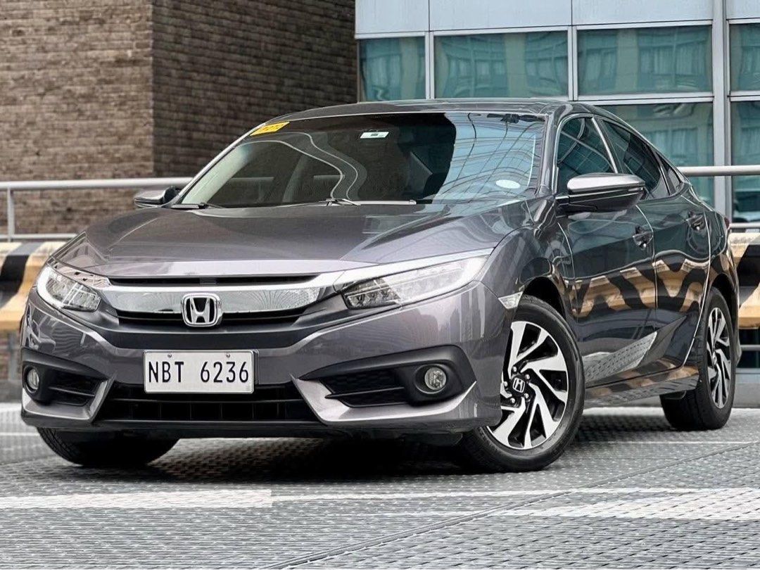 Honda Civic 1.8 (A) (Category: Used Cars) located in Makati City. Submitted by maby_latido05 (Listing ID 1461015753, Image 2). Description: 2018 Honda Civic 1.8 E Gas AT 71k ALL IN DP‼️🔥 ALL IN LOW DP PROMO ALL IN CASHOUT - Php 71,000 2 YRS - Php 38,801 3 YRS - Php 28,035 4 YRS - Php 23,247 (Chattel & Insurance included) FREE FULL VEHICLE SCANNING FREE Transfer FREE Detailing FREE Bank Processing 100% LEGIT MILEAGE 1ST OWNERSHIP Well-maintained 