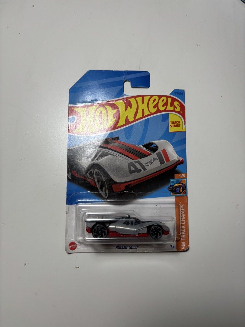 Hot Wheels Diecast Cars - Various Models (Category: Vehicle & Diecast Models) located in Agdangan. Submitted by omomsyj (Listing ID 1461056655, Image 3). Description: Selling 6 Hot Wheels cars — perfect for collectors, kids, or anyone looking to add to their collection! 💰 ₱50 each 📦 Bundle price: ₱300 for all 6 + sf ✅ Cars are unopened/sealed ⚠️ Card condition varies — some have slight discoloration, fading, creases and signs of storage wear. P