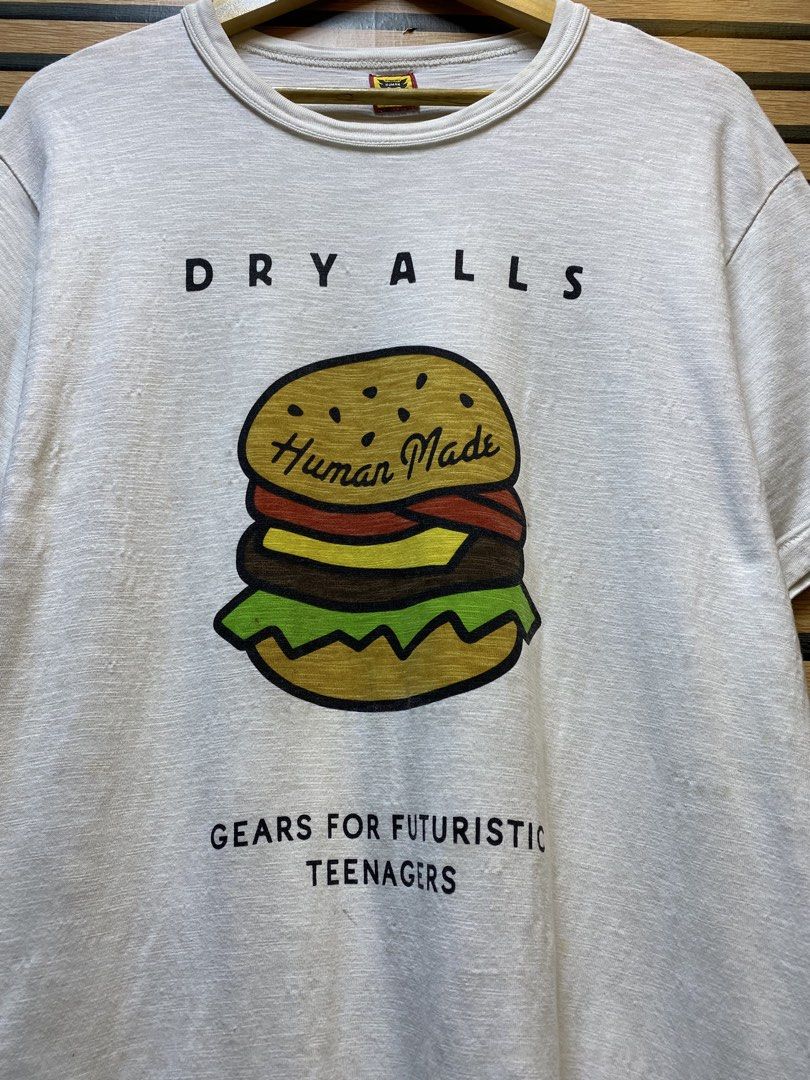 HUMAN MADE “DRY ALLS” BURGER GRAPHIC TEE (Category: Tshirts & Polo Shirts ) located in Makati City. Submitted by drip.poww (Listing ID 1461099174, Image 3). Description: - Authentic Human made - Color: White - Size: Meduim - Dimes: 21x30 - Authentic - Excellent condition - Need wash, fresh from bale - Material: 100% Cotton Please don’t expect too much—these are thrifted (ukay) items. 😊 !!STILL NEGOTIABLE!!.