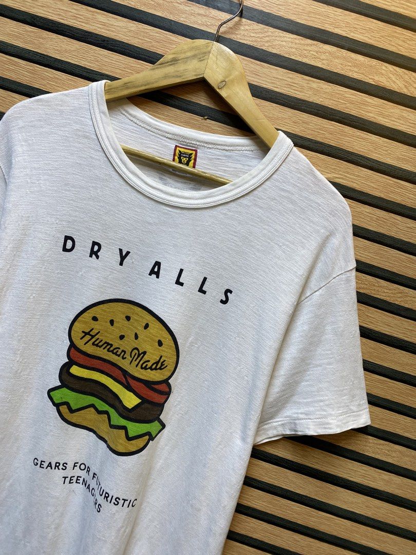 HUMAN MADE “DRY ALLS” BURGER GRAPHIC TEE (Category: Tshirts & Polo Shirts ) located in Makati City. Submitted by drip.poww (Listing ID 1461099174, Image 2). Description: - Authentic Human made - Color: White - Size: Meduim - Dimes: 21x30 - Authentic - Excellent condition - Need wash, fresh from bale - Material: 100% Cotton Please don’t expect too much—these are thrifted (ukay) items. 😊 !!STILL NEGOTIABLE!!.