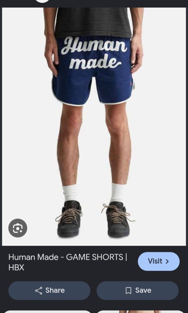 Human Made Game Shorts (Category: Shorts) located in Paranaque City. Submitted by reymart_1 (Listing ID 1460934051, Image 2). Description: -navy Human Made Game Shorts featuring a bold cursive logo across the front and contrast white piping along the edges. -Authentic -No issue -XL -like new condition -like new color rate.