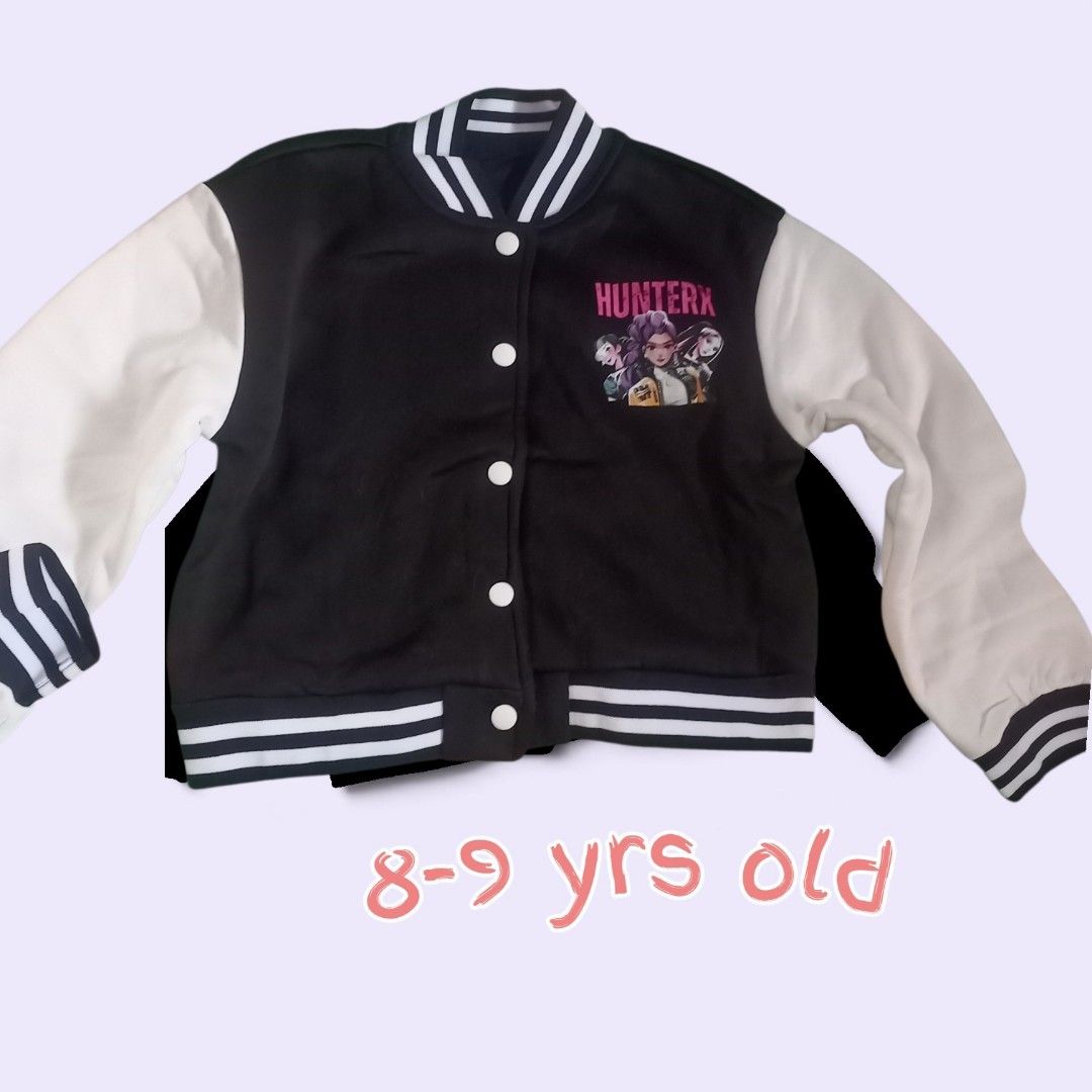 Hunterx Varsity Jacket for 8-9 Year Olds (Category: Babies & Kids Fashion) located in Manila. Submitted by crustynico23 (Listing ID 1460933236, Image 1). Description: - Stylish black and white varsity jacket - Features a cool Hunterx graphic print - Ribbed cuffs and hem for a snug fit - Ideal for kids aged 8-9 years old - Perfect for everyday casual wear.
