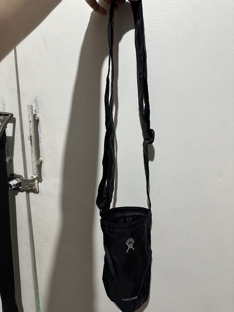 Hydro Flask Medium Packable Bottle Sling Black Unisex Accessories (Category: Water Bottles & Tumblers) located in Manila. Submitted by shopkriscloset (Listing ID 1460988733, Image 1). Description: Brand new. Never been used, stored only. Last photo for reference only using my KK tumbler :) Bought for 2190 pesos ‼️PLEASE READ BEFORE PLACING AN OFFER: 🩵Please be patient and respectful. 🤗 If I don’t get to reply immediately, I might be working. 🧡