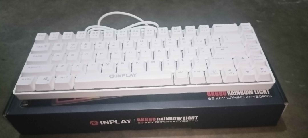 INPLAY BK880 Rainbow Light 60% Gaming Keyboard (Category: Computer Keyboard) located in Caloocan City. Submitted by spdrain (Listing ID 1461009706, Image 1). Description: - White INPLAY BK880 Gaming Keyboard - Compact 60% Layout - Vibrant Rainbow Lighting - Ideal for Gaming & Everyday Use - Includes Original Box - Feel free to ask questions! Can do lalamove MOP: GCASH/BDO/MAYA/MARIBANK .