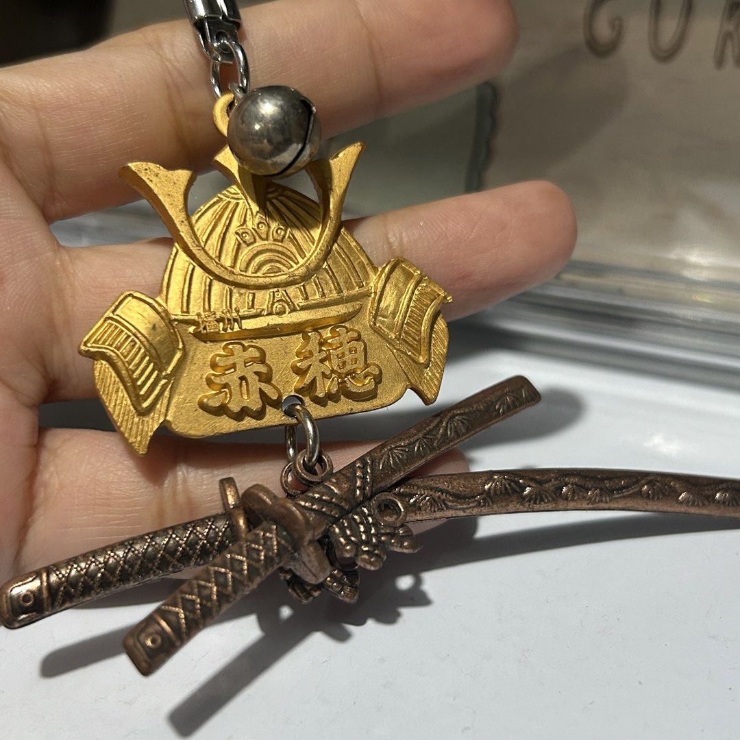 Japanese Samurai Helmet Metal Keychain (Category: Other Stationery & Craft) located in Quezon City. Submitted by kitsune.treasures (Listing ID 1461114433, Image 2). Description: *First to pay policy! *1 day reservation only. Failure to pay on time, auto cancel. 📍Quezon City * MOD: J&T | Lalamove * MOP: GCASH | BPI 📦ON HAND AND READY TO SHIP! CONDITION: WHAT YOU SEE IS WHAT YOU GET. Dimensions: Kindly check the photos for the actual measurements