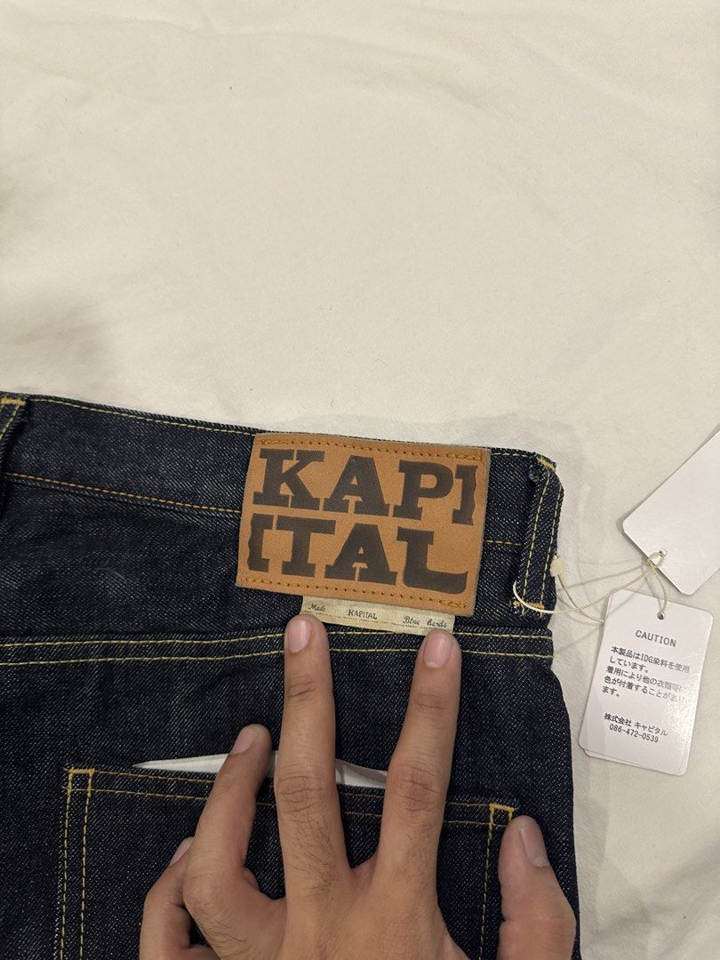 Kapital Okabellbo (Category: Jeans) located in Makati City. Submitted by heartbreakwarfare55 (Listing ID 1461044422, Image 1). Description: - Kapital Dark Wash Jeans - Made in Japan (Mitsu Factory, Okayama) - Size: 36 - Features a leather patch on the back - Care Instructions: Warm wash, line dry in shade, do not iron on leather parts ***This one fits a true to size 33-35, snug on the thighs. Brand new with tags bought from blueingreen soho for 2