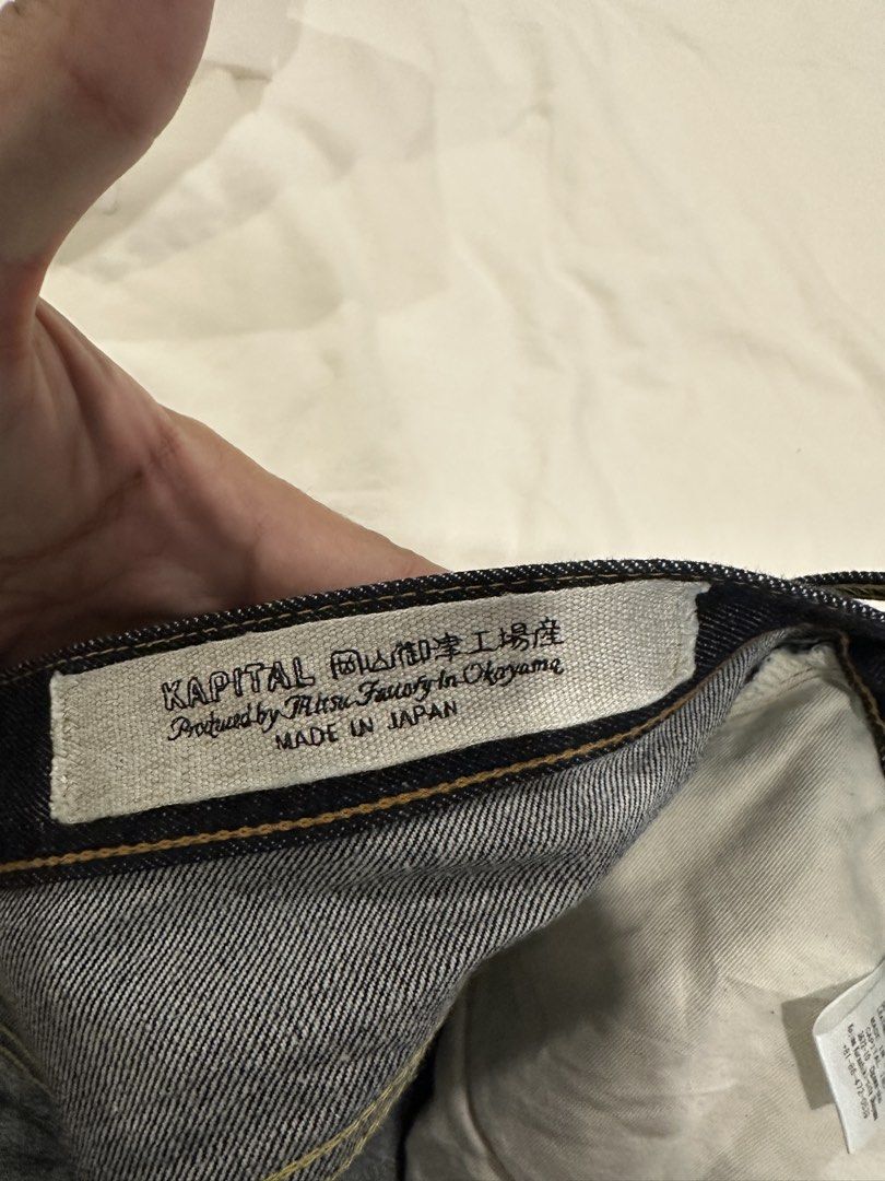 Kapital Okabellbo (Category: Jeans) located in Makati City. Submitted by heartbreakwarfare55 (Listing ID 1461044422, Image 2). Description: - Kapital Dark Wash Jeans - Made in Japan (Mitsu Factory, Okayama) - Size: 36 - Features a leather patch on the back - Care Instructions: Warm wash, line dry in shade, do not iron on leather parts ***This one fits a true to size 33-35, snug on the thighs. Brand new with tags bought from blueingreen soho for 2