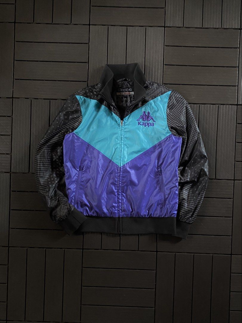Kappa Track Jacket X Large Teal Purple Black (Category: Coats, Jackets and Outerwear) located in Puerto Princesa. Submitted by streetnfinds (Listing ID 1461071700, Image 1). Description: Length: 24" Width: 19.5" Sleeve Length: 25" Medium - Awesome Kappa track jacket - Iconic Kappa logo on chest - Colorblocked design: Teal, Purple, Black - Cool all-over graphic print on back - Zipper closure with pockets - Size: X Large (XL).