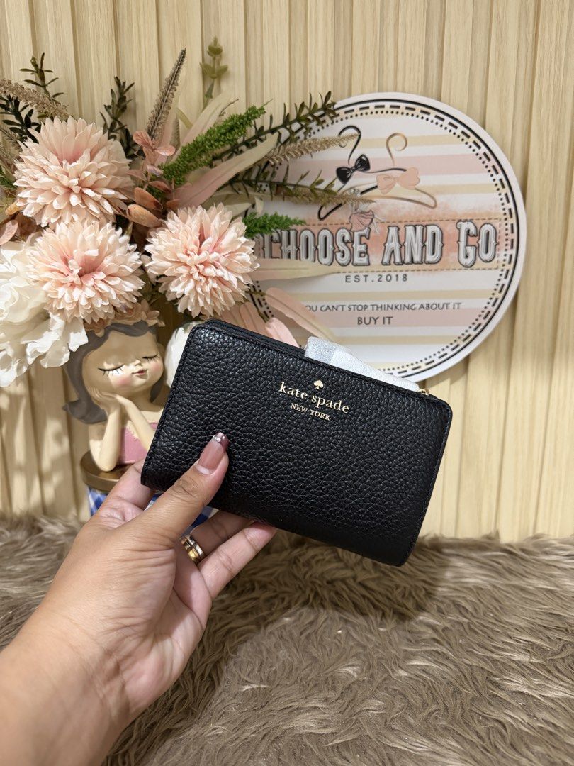 KATE SPADE LENA MEDIUM BIFOLD WALLET - BLACK (Category: Wallets & Card holders) located in Cabanatuan. Submitted by chooseandgo (Listing ID 1461035833, Image 2). Description: AVAILABLE, FRESH FROM THE ✈️ 🌸 K@TE SPADE LENA MEDIUM BIFOLD WALLET 🌸 - Black See photos for inclusions (Tag, and poly plastic) -------------------------------------------------- • PINAS ONAHD NA PO(Shipping via LBC) • 💯Guaranteed Original/Authentic, Money back guaranteed