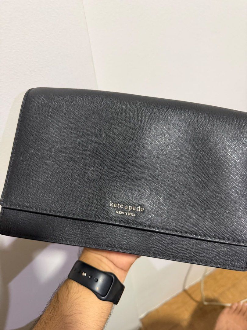 Kate Spade New York Black Leather bag (Category: Luxury Bags & Wallets) located in Paranaque City. Submitted by kaina1849240 (Listing ID 1461006129, Image 1). Description: - Authentic Kate Spade wallet in classic black. - Durable Saffiano leather exterior. - Signature Kate Spade spade lining inside. - Secure snap closure. - Multiple card slots and compartments for excellent organization..
