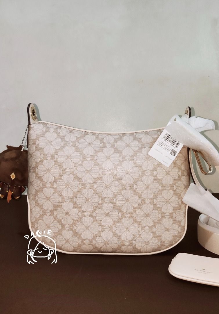 Kate Spade Shoulder Bag with Matching Pouch (Category: Luxury Bags & Wallets) located in Caloocan City. Submitted by fukurodanie (Listing ID 1461065013, Image 3). Description: KATE SPADE SIGNATURE SPADE FLOWER PVC CROSSBODY ✨ Authentic ✨ Never used ✨ Original price: 399 USD 👉 Other items in photo NOT included; only there for size reference.