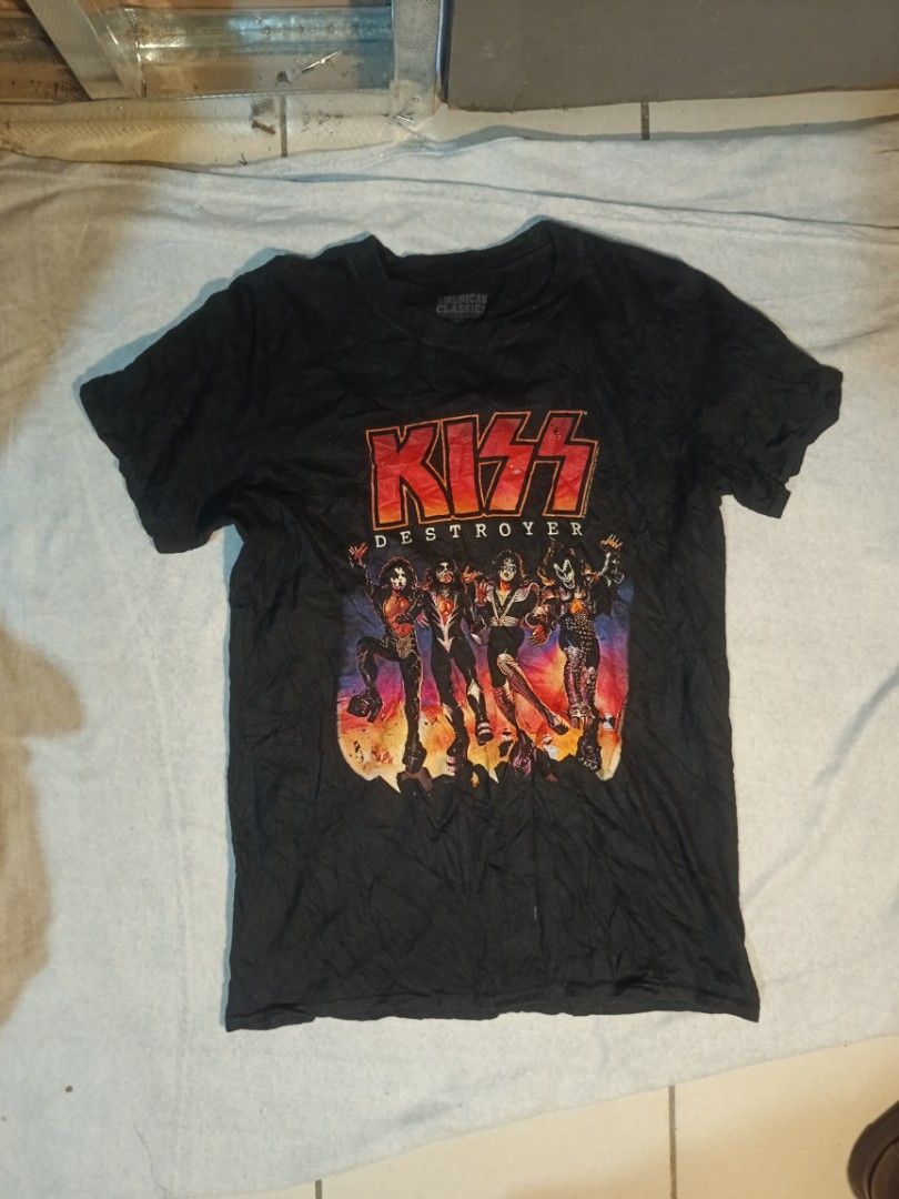 KISS Destroyer T-Shirt (Category: Tshirts & Polo Shirts ) located in Kapatagan. Submitted by corsethrift (Listing ID 1460952599, Image 1). Description: - Iconic KISS Destroyer album art printed on a black t-shirt. - Features the band members in their classic costumes. - Vibrant and detailed print quality. - Officially licensed by American Classics. - A must-have for any KISS Army member!.