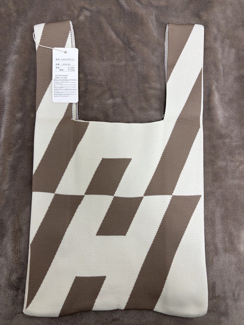 Knit Knot Bag (Category: Tote Bags) located in Paranaque City. Submitted by b.lyka (Listing ID 1461023059, Image 3). Description: Bought in Japan (still with tag) Color: Cream and brown.
