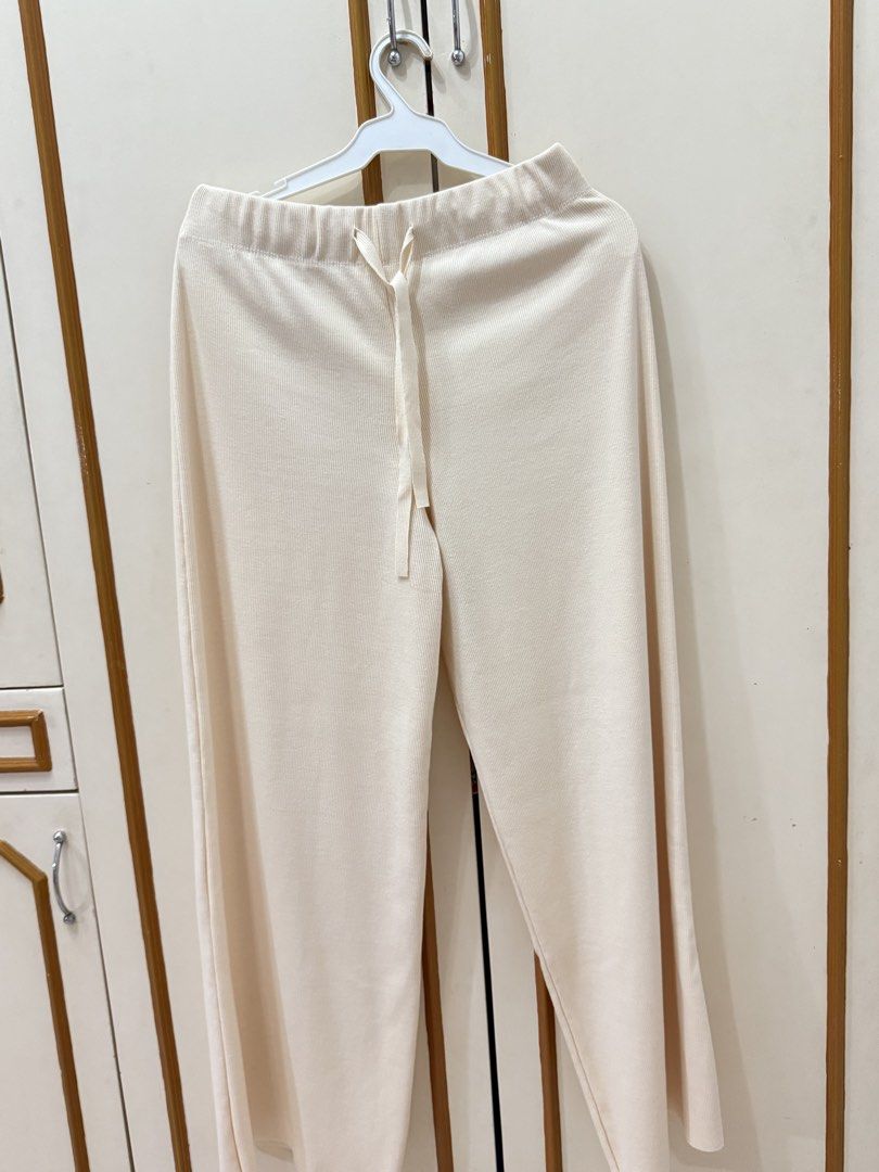Cream Ribbed Wide-Leg Lounge Pants (Category: Other Bottoms) located in Binangonan. Submitted by driftcloset (Listing ID 1461006358, Image 1). Description: Soft cream ribbed pants with a relaxed wide-leg fit and elastic waistband with drawstring. Comfortable and easy to style for lounging, errands, or casual everyday wear..