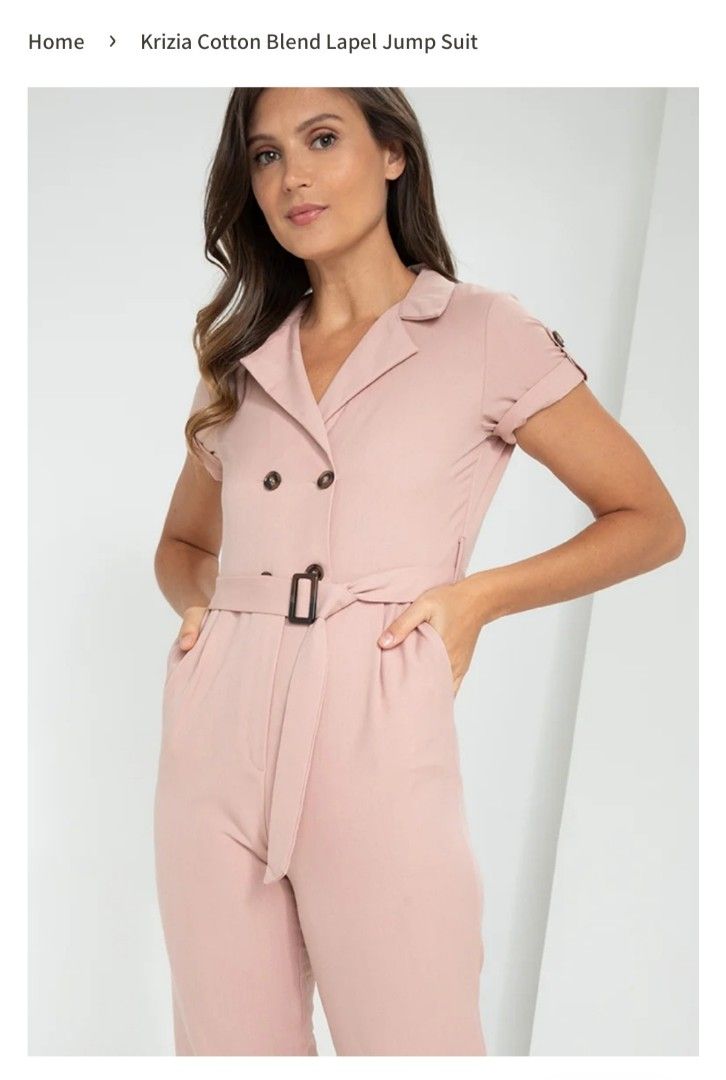 Krizia Cotton Blend Lapel Jumpsuit Pink (Category: Jumpsuits) located in Manila. Submitted by thea.magz (Listing ID 1461019309, Image 2). Description: - Stylish Old Rose Pink Krizia jumpsuit - Lapel collar and double-breasted button closure - Belted waist with buckle for a defined silhouette - Short sleeves with button detail - Versatile for casual or semi-formal occasions - Comfortable cotton blend fabric - Once used only RFS: Decluttering Shipp
