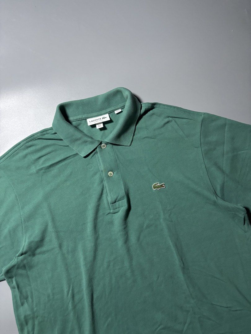 Lacoste polo shirt (Category: Tshirts & Polo Shirts ) located in Manila. Submitted by austinace04 (Listing ID 1460938845, Image 2). Description: - Good As New - Size L On Tag - 22 x 28 - Issue None.